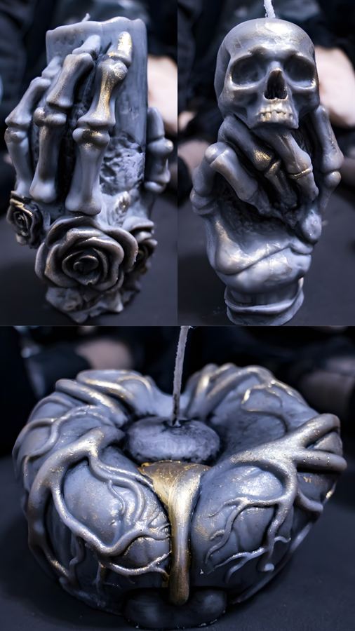 Drei Kerzen: Skeletthand mit Rosen, Totenkopf in Hand und Herz mit Wurzeln